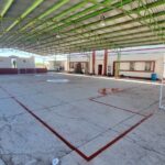 Realizan rehabilitación en la cancha de fútbol en escuela